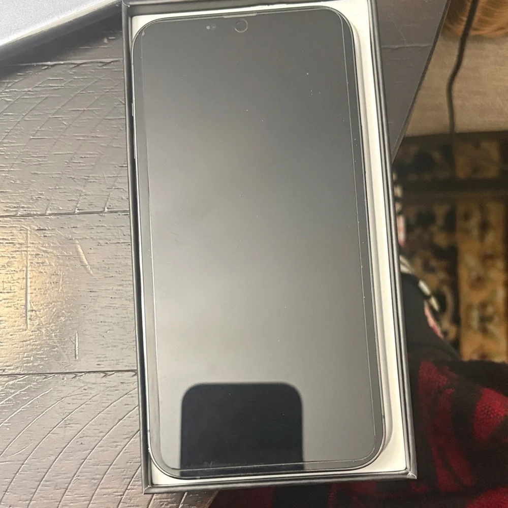 Apple Smartphone with White Charging Cable